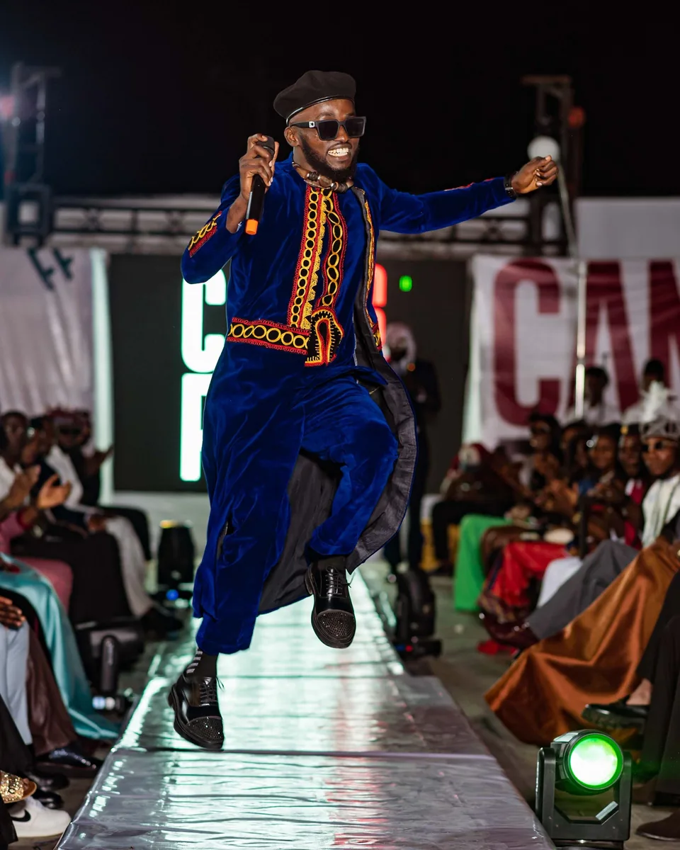 Performer leaping on the CAMFFEST runway