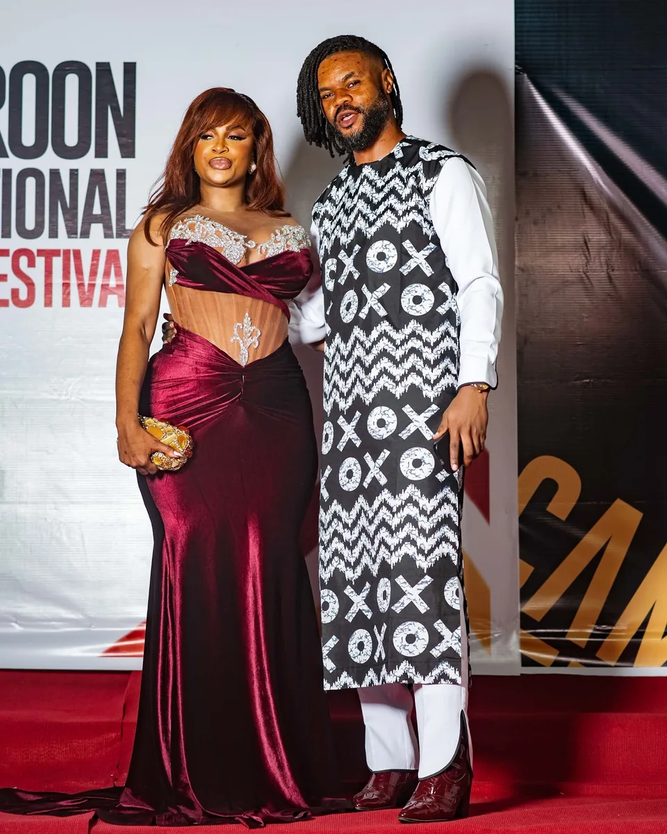 Couple in burgundy velvet and black-and-white print