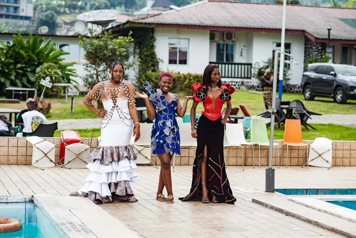 Models showing looks beside the pool
