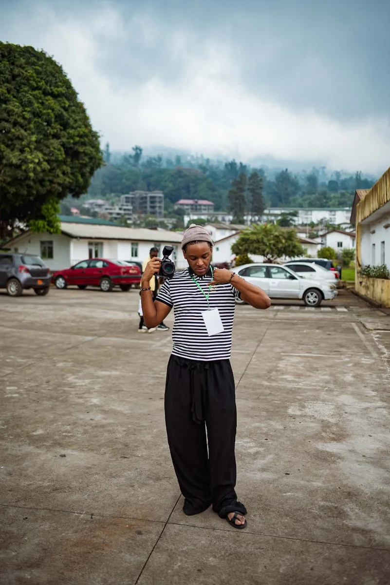 Photography student shooting outdoors in Buea
